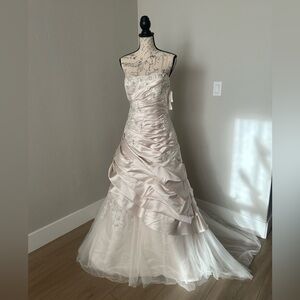David’s Bridal - never worn out wedding dress.